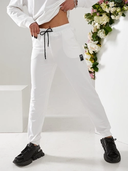 Спортивні жіночі штани білого кольору