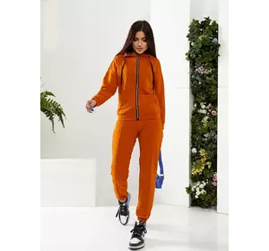 Спортивний жіночий костюм помаранчевого кольору